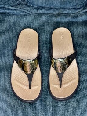 CROCS Brown Thong Sandals with Gold Metallic Medallion